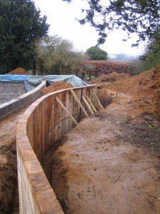 New Oak sleeper wall going into place.