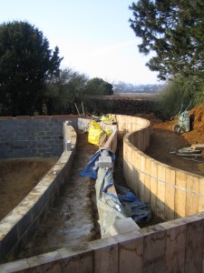 The Oak sleeper edge Swimming pond for a garden designer - The Oak sleeper edge