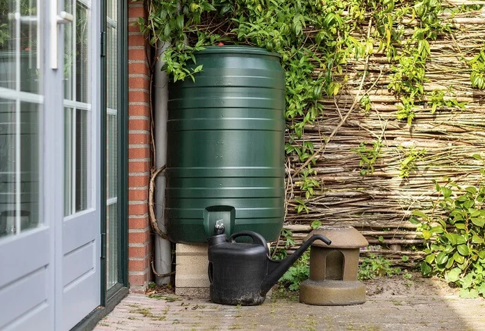An image of a Water butt collecting rain from a downpipe and a 